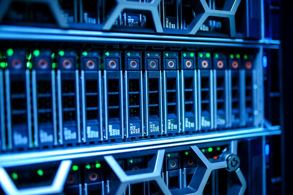 Server room with blue lighting representing IT infrastructure